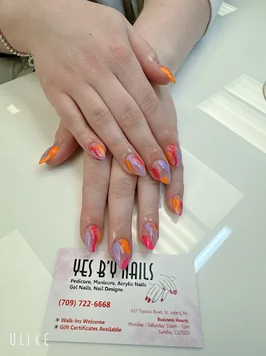 Orange, pink and lilac swirl nail art